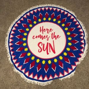 Brand new beach towel, comes with a carrying strap